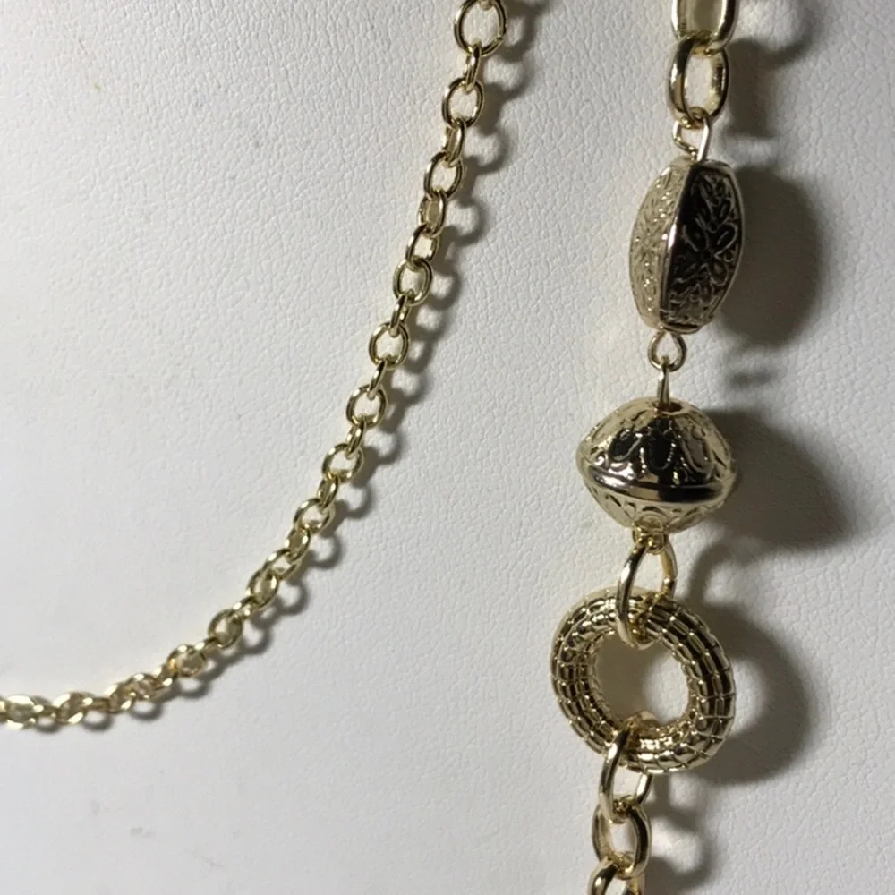 Shiny gold tone necklace/ double strands in very good pre-owned condition